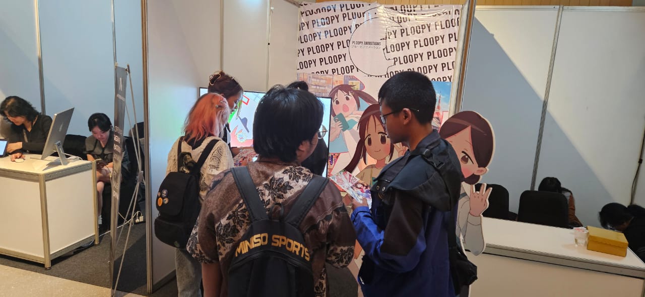 BEAST festival visitors at Ploopy Animations' booth